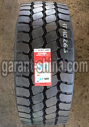 Leao KXA400 (прицеп-карьер) 385/65 R22.5 164J 24PR - Фото реальнойго протектора с этикеткой вблизи